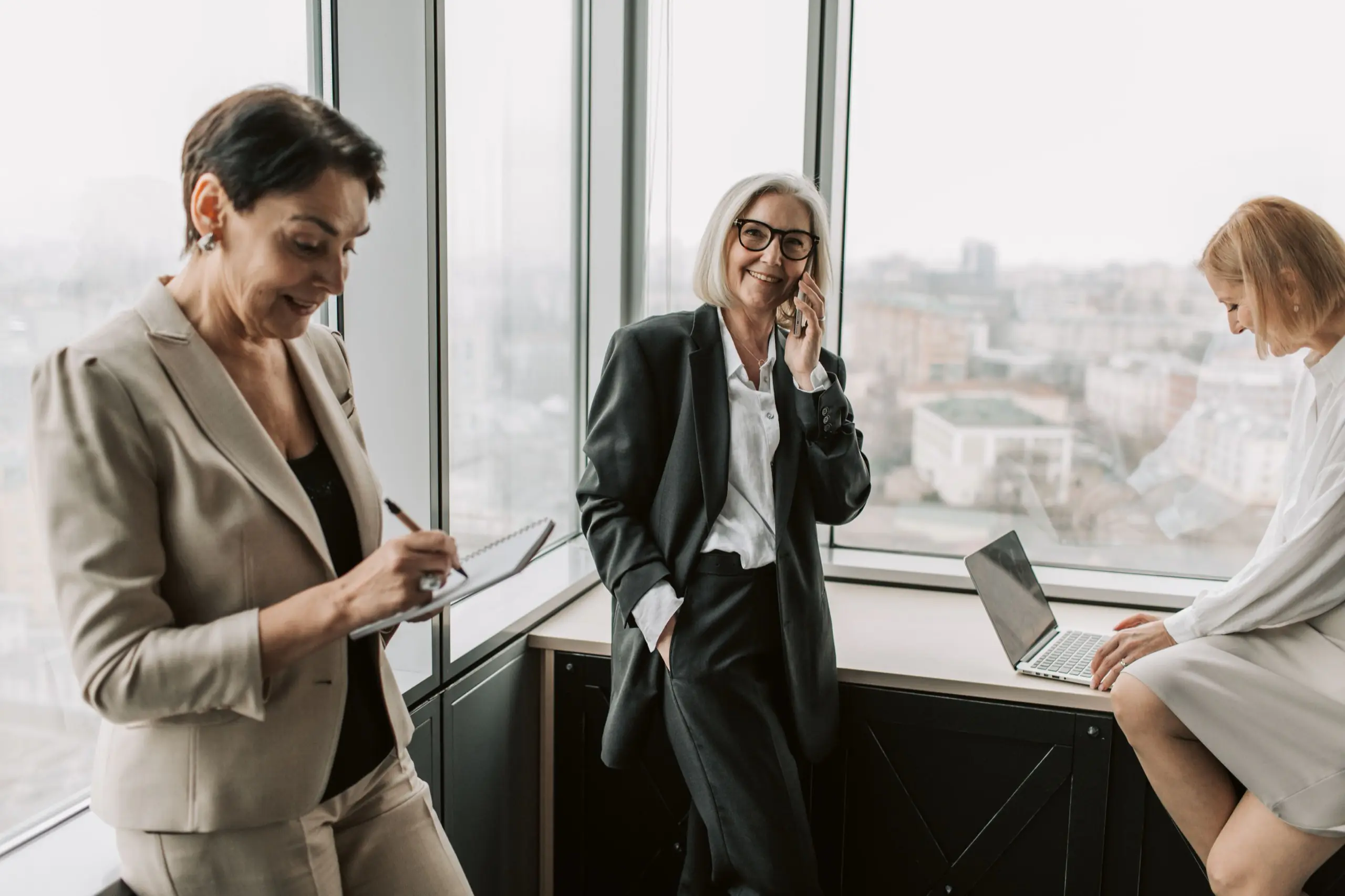 A senior accountant in a London office, looking directly at the camera